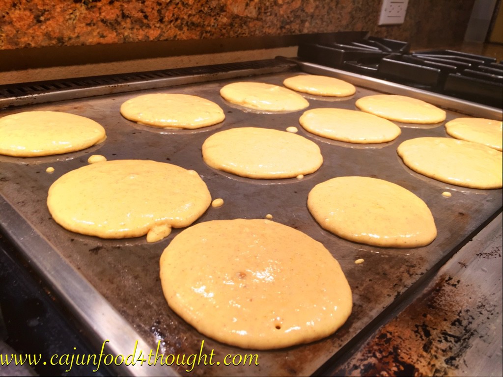 Easy and delicious pumpkin pancakes going the griddle